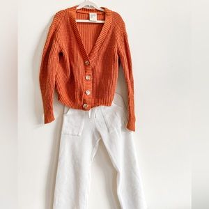 Girls size 8, orange and white knit sweater and pants set.